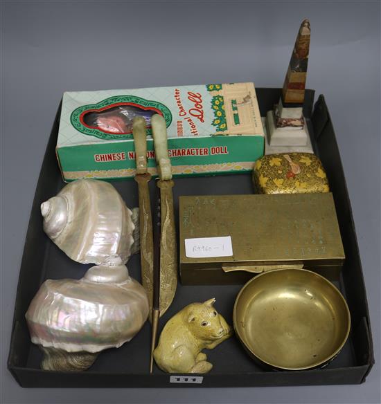 A group of Chinese items including the figure a dog, an inscribed box, a pair of belt hook handled paper knives, a brass bowl,